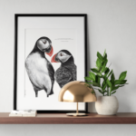 Dessin d'un couple de macareux accompagné d'une citation sur l'amour éternel de Marcelle Auclair. Disponible en affiche 30 X 40 cm.